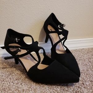 Black cross strap heel.